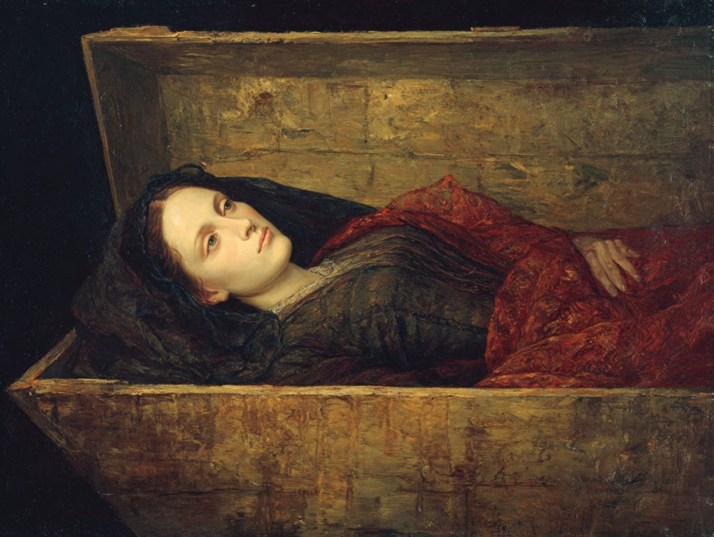 Mujer en ataúd